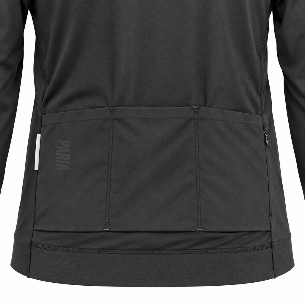 Close-up of the back of a black long-sleeve cycling jersey, showing a large rear zip pocket with the brand name 'PARIA' printed vertically in gray on the left side of the pocket.