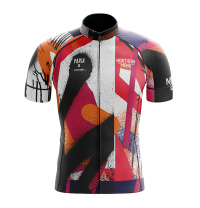 Front view of the Northern Monk x PARIA women’s cycling jersey featuring bold graffiti artwork by a local street artist in red, orange, black, and white