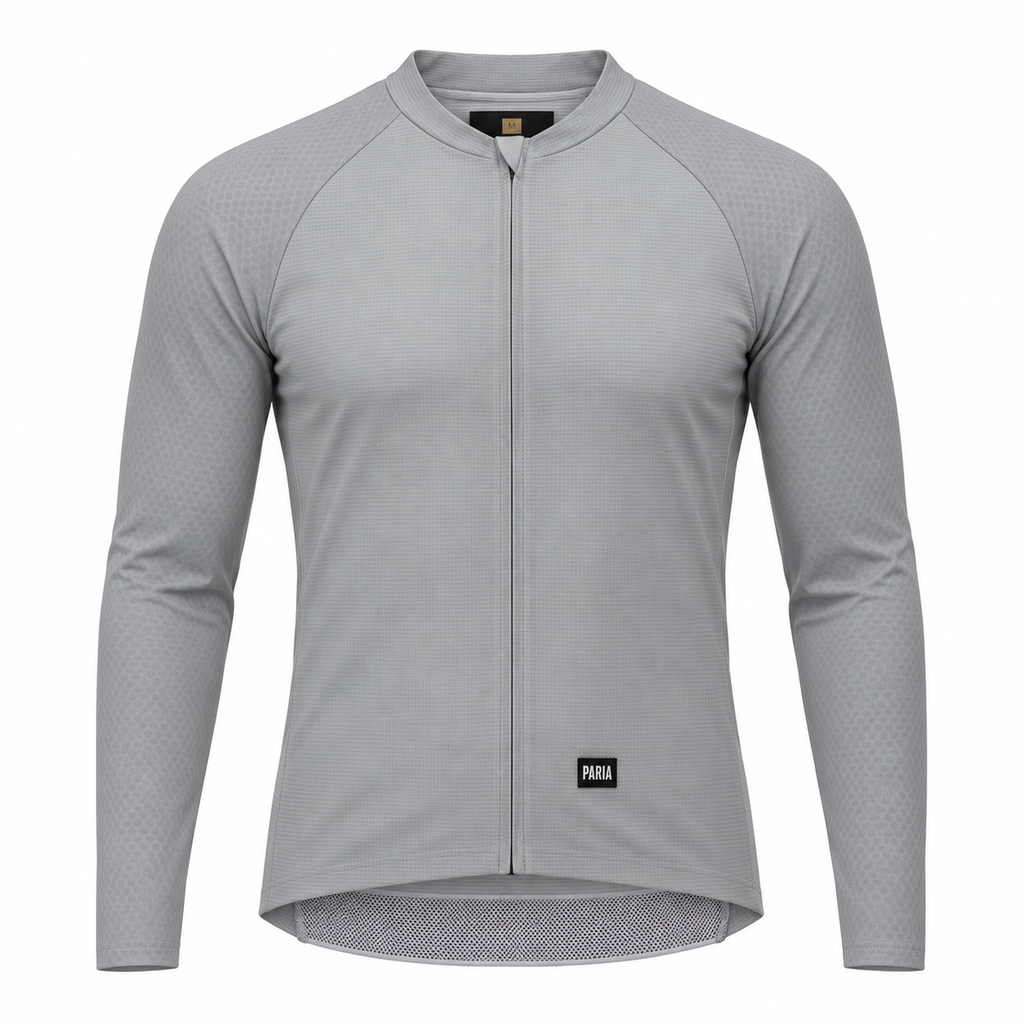 A light gray long-sleeve cycling jersey with a full-length front zipper, raglan sleeves, and a subtle textured pattern, shown on a plain white background.
