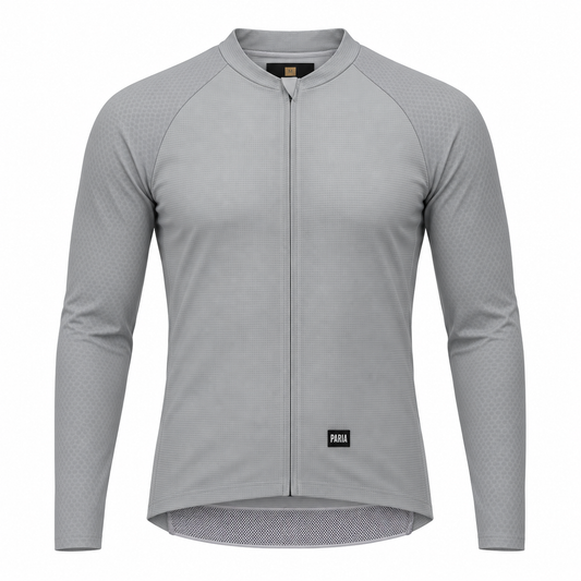 A light gray long-sleeve cycling jersey with a full-length front zipper, raglan sleeves, and a subtle textured pattern, shown on a plain white background.