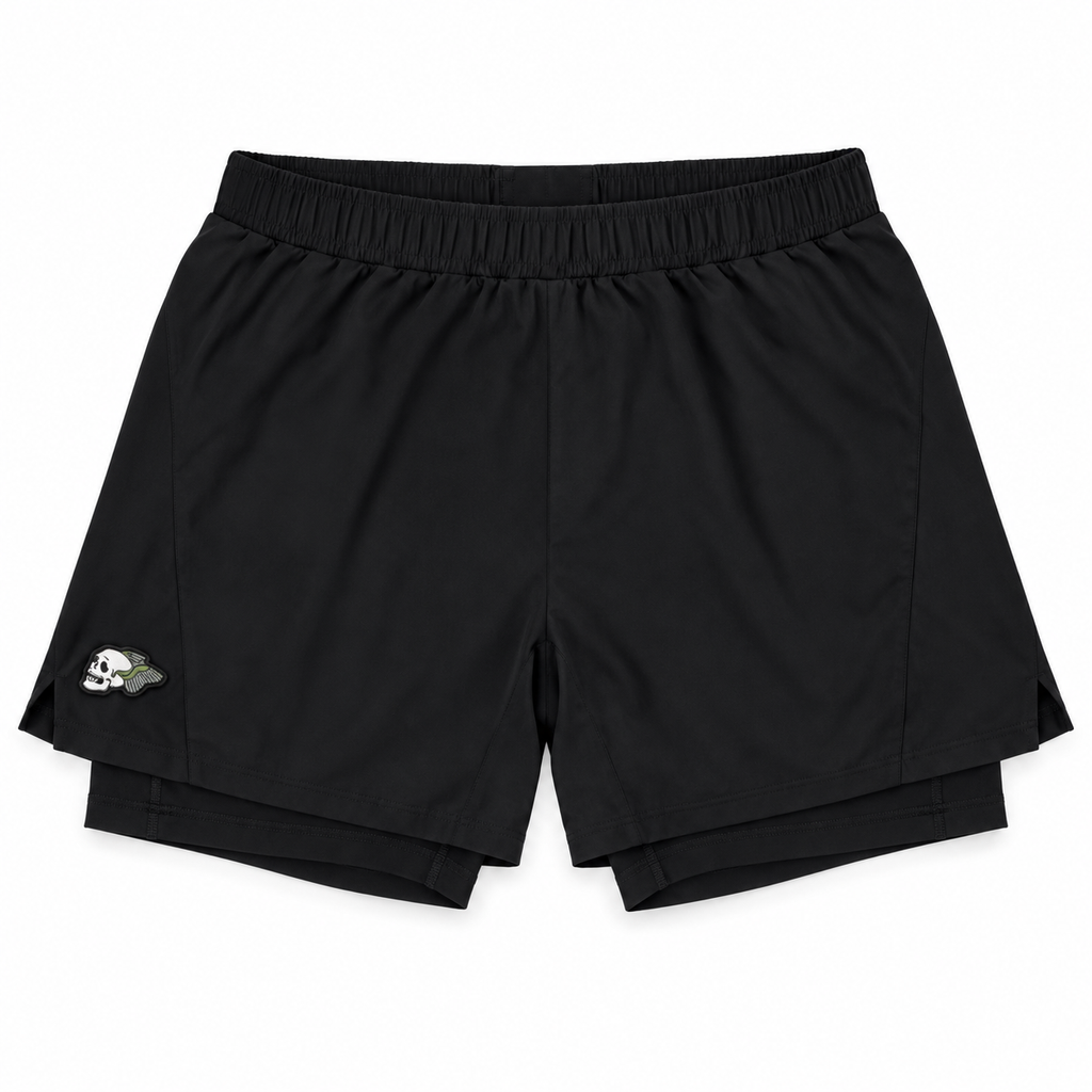 Black athletic shorts with an elastic waistband and a small embroidered logo on the lower left leg, displayed flat against a white background.