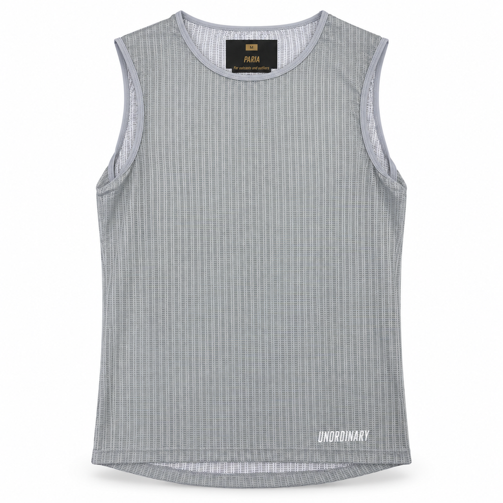A sleeveless ribbed knit tank top in light gray with a small white 'UNORDINARY' logo printed near the bottom right hem, shown against a plain white background.