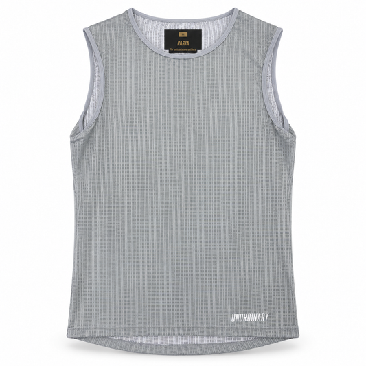 A sleeveless ribbed knit tank top in light gray with a small white 'UNORDINARY' logo printed near the bottom right hem, shown against a plain white background.