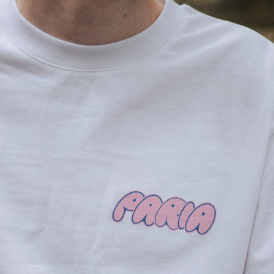 White t-shirt with 'PARIA' printed in pink in bubble print